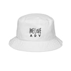 White bucket hat with 'WE LOVE ADV' text on a white background
